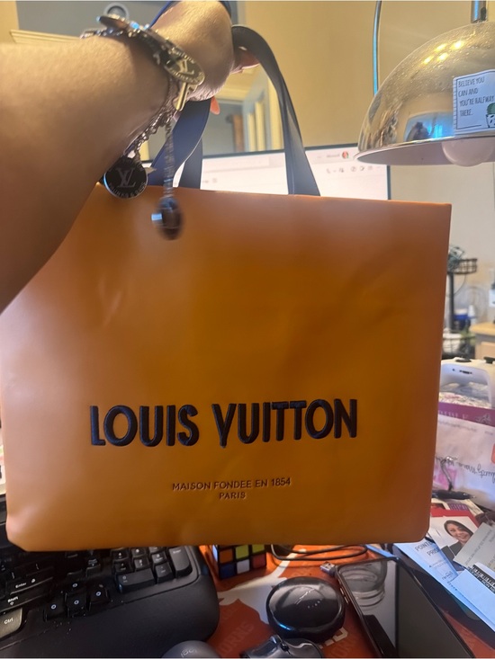 Louis Vuitton Handbags - Louis Vuitton Orange Tote with Black Logo and Handles